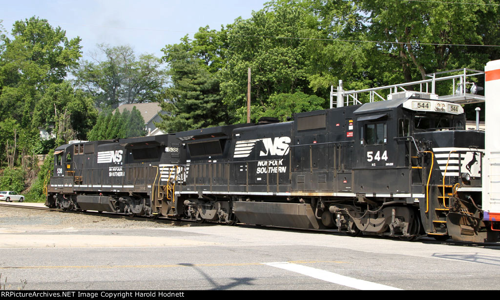 NS 538 & 544 lead train E60 across Fairview Road